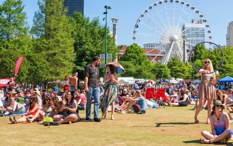 People enjoying Centennial Olympic Park during the 2016 SweetWater 420 Music Festival.