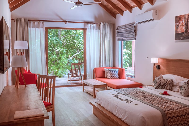 Reethi Faru Resort Delux Beach Villa Bedroom 1