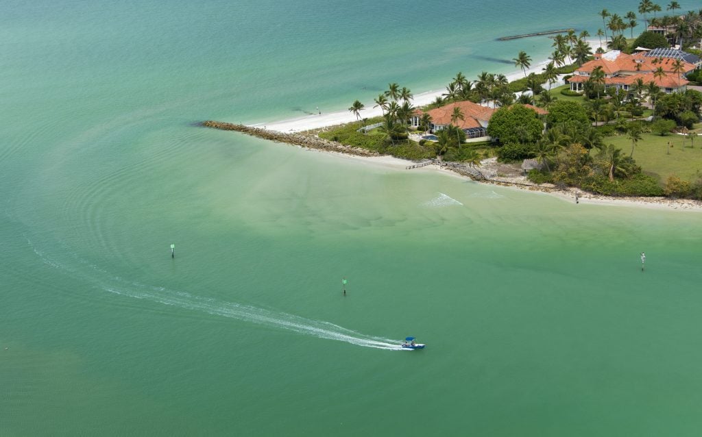 A boat comes into Gordon Pass from the Gulf of Mexico in Naples on May 11, 2016 in Naples, FL. Photo by Darron R. Silva