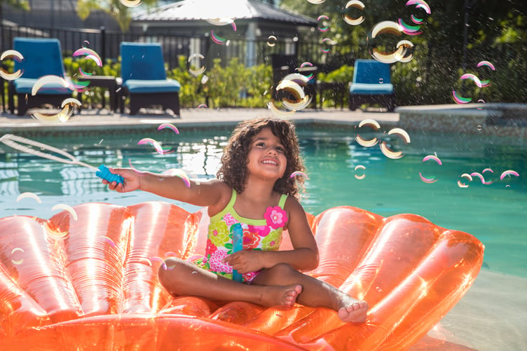 Experience Kissimmee Small girl in Villa Pool