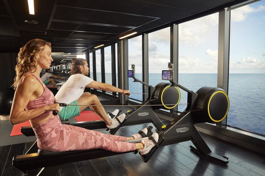 Sailors work out on rowing machines in B-Complex gym onboard Scarlet Lady.  Photoshoot of Vitamin Sea activities by Melanie Acevedo onboard Scarlet Lady, Virgin Voyages
Photoshoot of Vitamin Sea activities by Melanie Acevedo onboard Scarlet Lady, Virgin Voyages
Vitamin Sea & Project Jackson Photoshoot Cabins onboard SCL  Shoot Date: Sept 18-25, 2021
Shoot Location: Transit from NY-Bimini  Usage: Worldwide/universal unlimited rights in perpetuity for all media including 3rd party usage (Virgin Brands) for all footage and images captured during the shoot. Excluding TV + Broadcast.
Talent Usage: 5 Years Worldwide/universal unlimited rights in perpetuity for all media including 3rd party usage for all footage and images captured during the shoot. Excluding TV + Broadcast. 
TEAM
Photographers:
Lifestyle: Melanie Acevedo
Cabins: Sang An
Agent: Kenna Zimmer, Sarah Laird & Good Company
https://sarahlaird.com  CD: Christian Schrader
Art Buyer / Producer: Kathy Boos