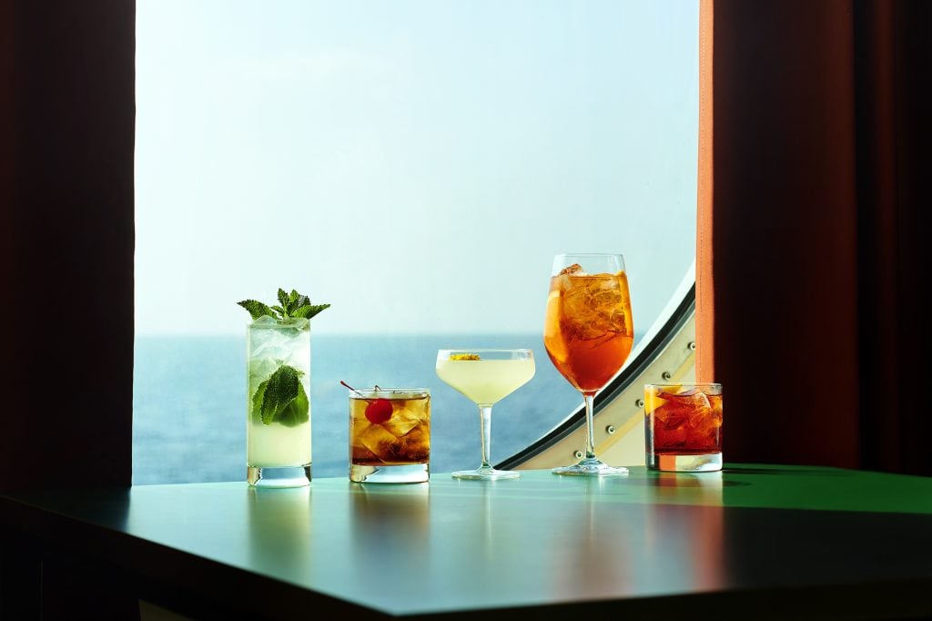 Cocktails lined up in front of a window at Extra Virgin. 
UK Photoshoot / Atlantis
Shoot Dates: Sept 27-30, 2021
Usage: Full Buyout
Goal: Food & Beverages
Deliverables: images, gifs, and videos  TEAM
Photographer: Scott Grummett
https://www.scottgrummett.com
Agent: Terri Manduca
Food Stylist / AD: Elisa Merlo  CD: Christian Schrader
Art Buyer / Producer: Kathy Boos