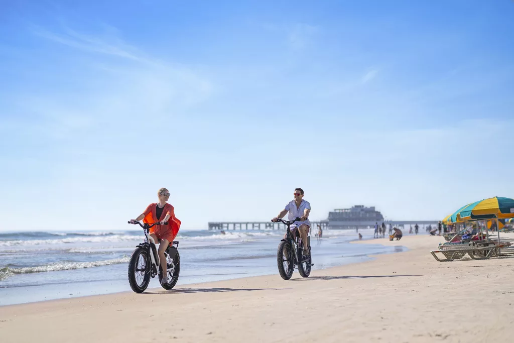 Daytona Beach Couple Electric Bikes Pier