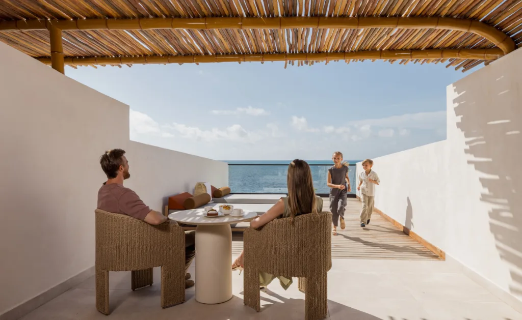 AVA Resort Cancun - Family on Balcony